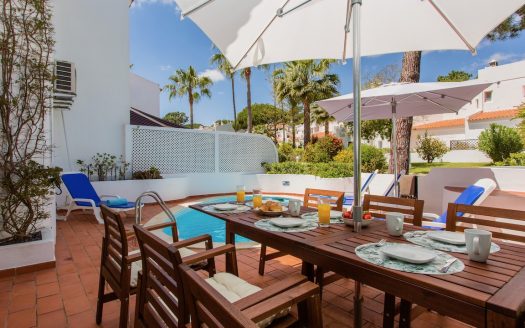 Blackbook luxury villa outdoor dining and pool area